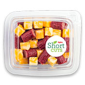 Cut beef sticks and cubed cheese in a plastic container