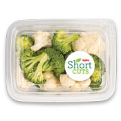 broccoli and cauliflower florets in a plastic container