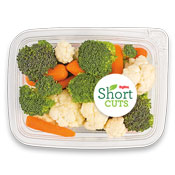 Carrots, broccoli, and cauliflower in a plastic container
