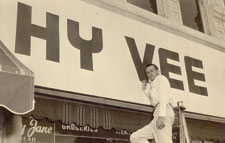 Creston Story Manager Harry Byars changes the store sign