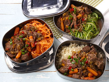 three serving dishes filled with italian petter shredded beef and side vegetables
