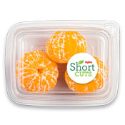 Peeled mandarins in a plastic container