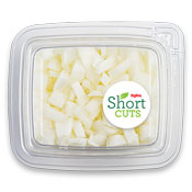 White onions that have been diced up and placed in a plastic container