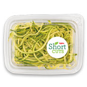 Zucchini that has been cut into noodles and placed in a plastic container