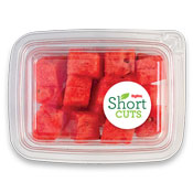 top view of a plastic container containing watermelon chunks